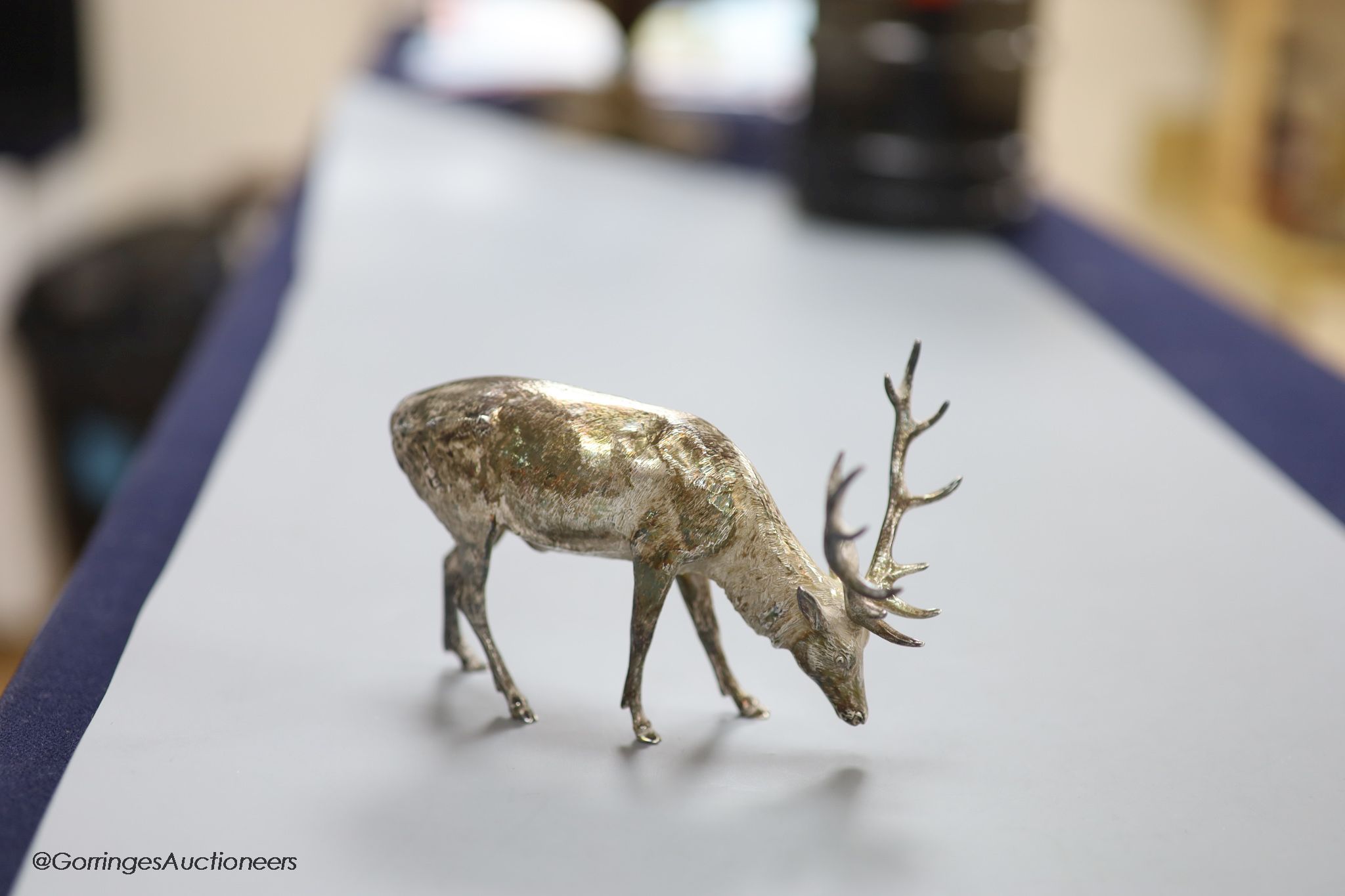 A modern free standing silver miniature model of a stag, C.F.H & Co, London, 1993, height 75mm, 195 grams.